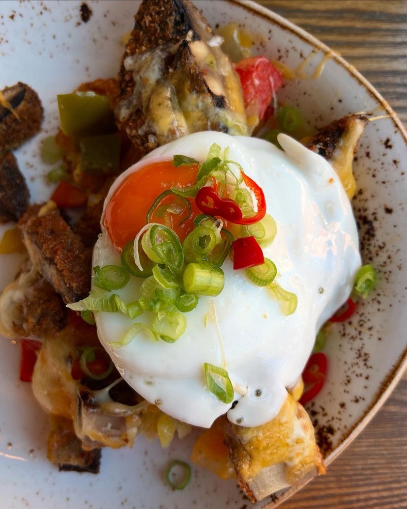 Fried egg on top of a mushroom hash