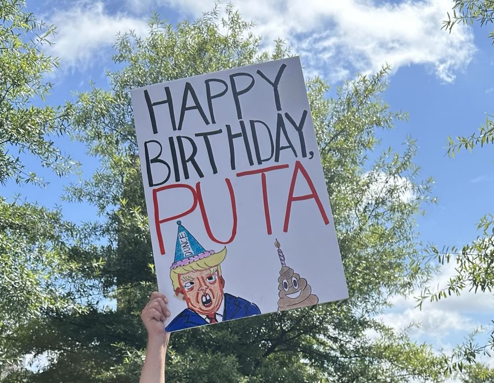 Protest sign saying, "Happy birthday PUTA"
