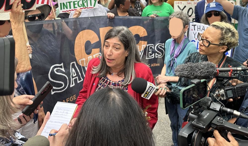 Deb Houry, CDC's former Chief Medical Officer, speaks to reporters at her clap out
