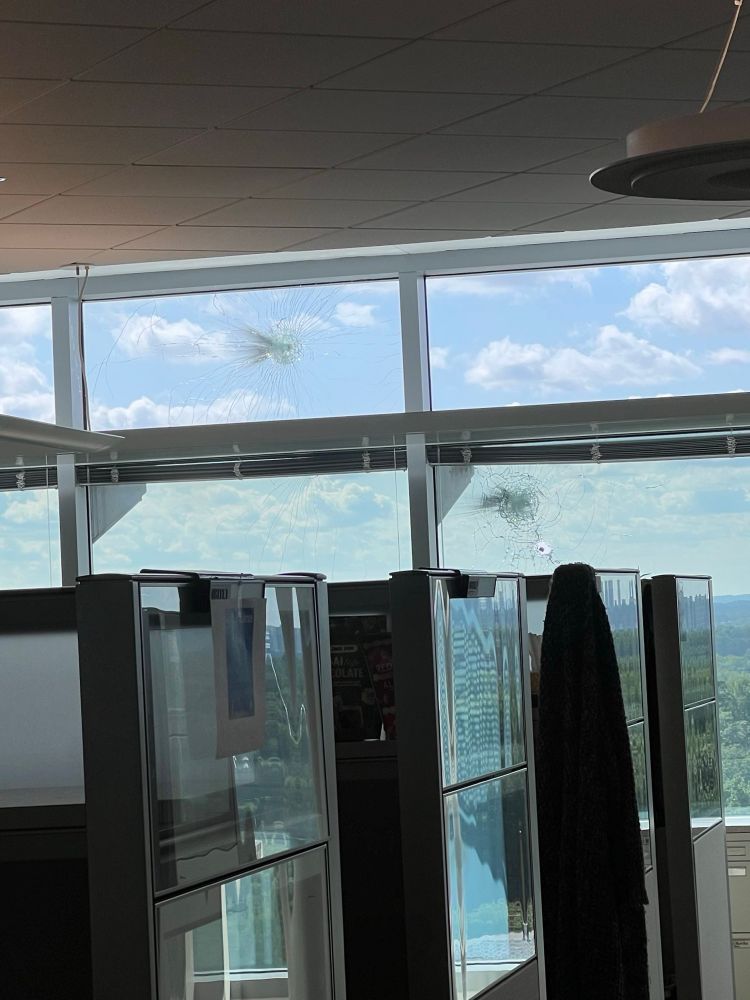 B21 8th floor bullet holes