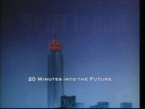 Background: a skyscraper with 23 on 2 sides near the top.
Caption: 20 Minutes into the Future
