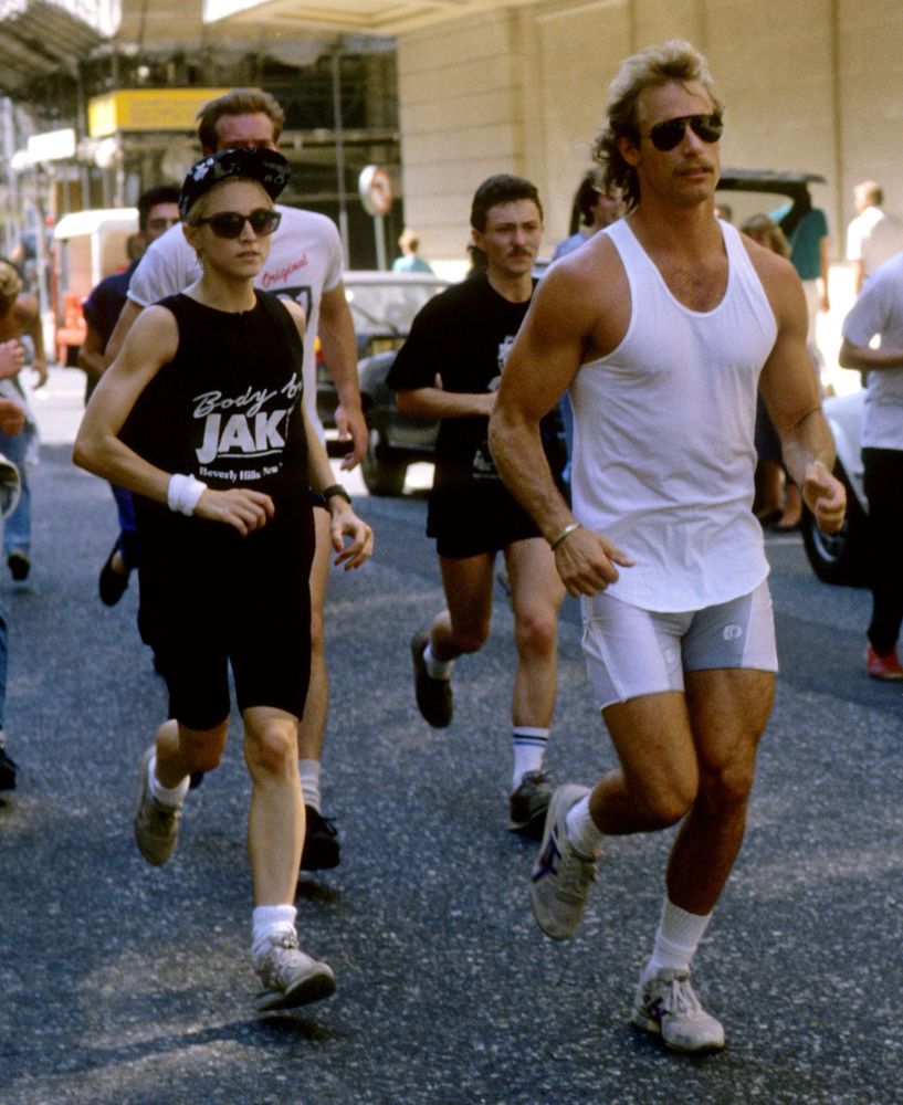 Madonna running with bodyguard and friends