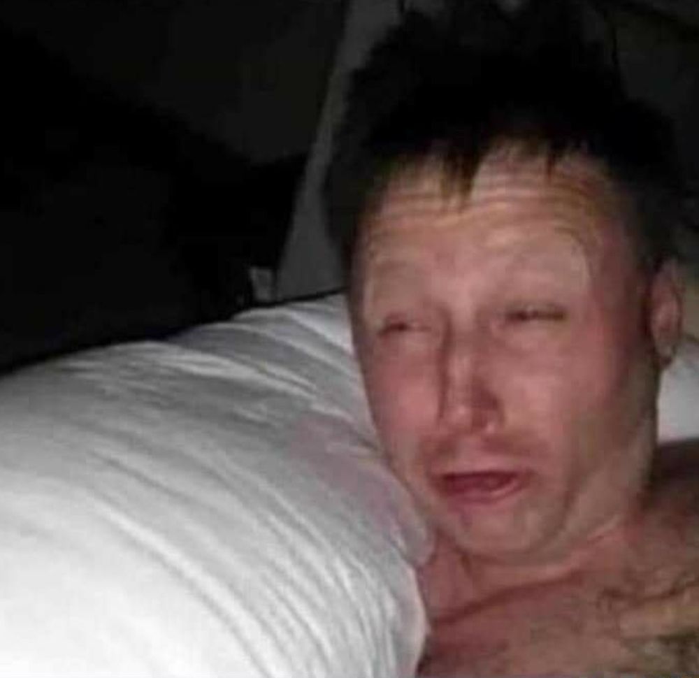 A popular meme of a man waking up and squinting into a bright light. He looks disoriented and confused.