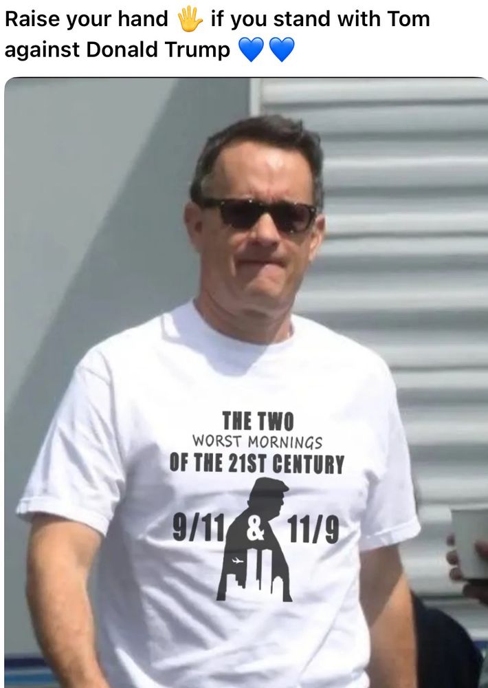 Tom Hanks T-shirt says “The two worst mornings of the 21st century. 9/11 & 11/9” overlaid with Trump and WTC silhouette. 