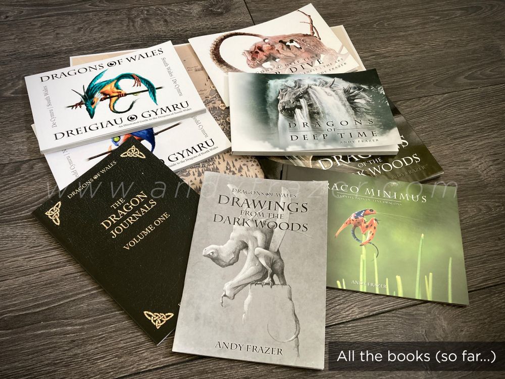 A promotional photo of my colourful dragon art books. 