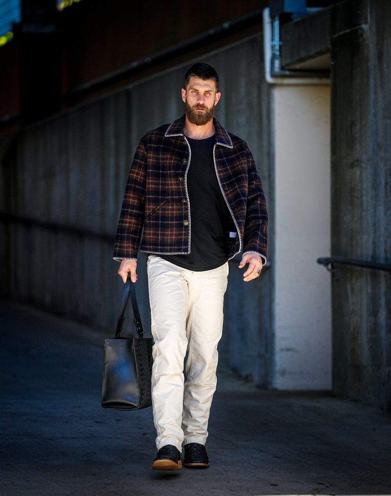 Bryce Harper looks at the camera as he arrives at Citizens Bank Park.