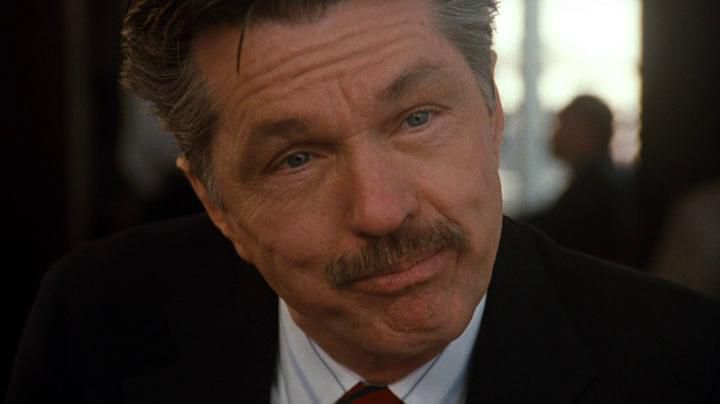 A smirking Tom Skerritt in Singles. 
