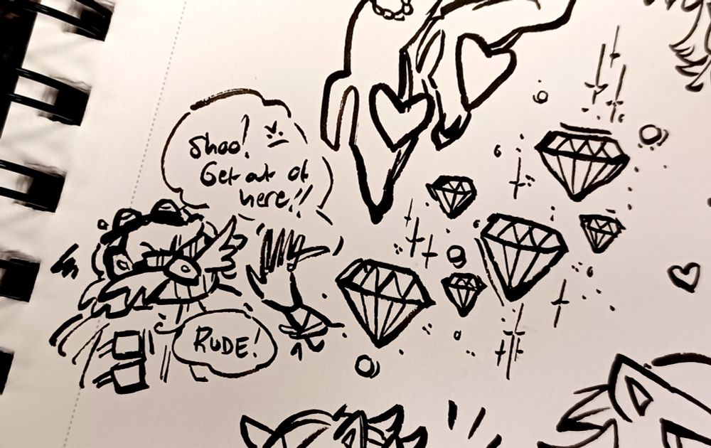 Traditional pen sketch on white paper of Eggman, a disembodied hand resembling the artist herself, and sparkling Chaos Emeralds. The Emeralds are loose filler doodles with lots of sparkles, and nearby the artist's hand is waving away Eggman from the Chaos Emeralds, who looks annoyed. Dialogue is as follows: Artist Hand: "Shoo! >:( Get out of here!!" Eggman: "RUDE!" 