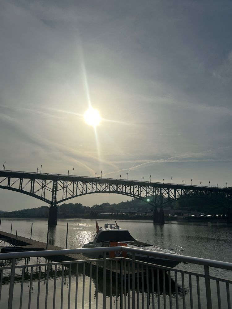 Sun shining over the Gay Street Bridge and Tennessee River in Knoxville