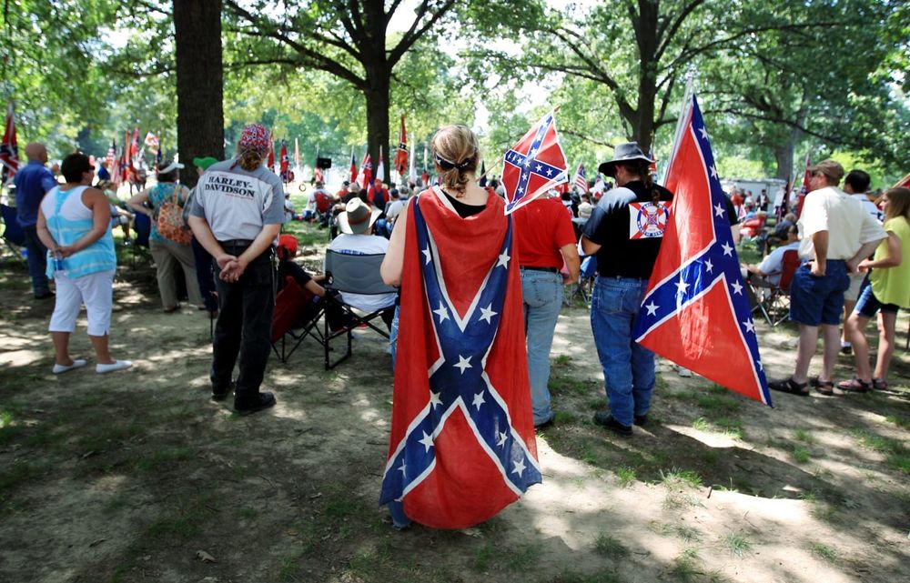 People draping themselves in the confederate flag. A flag representative of a movement to tear apart the United States of America fueled by the ideology that not all people are created equal. They clearly hate America.
