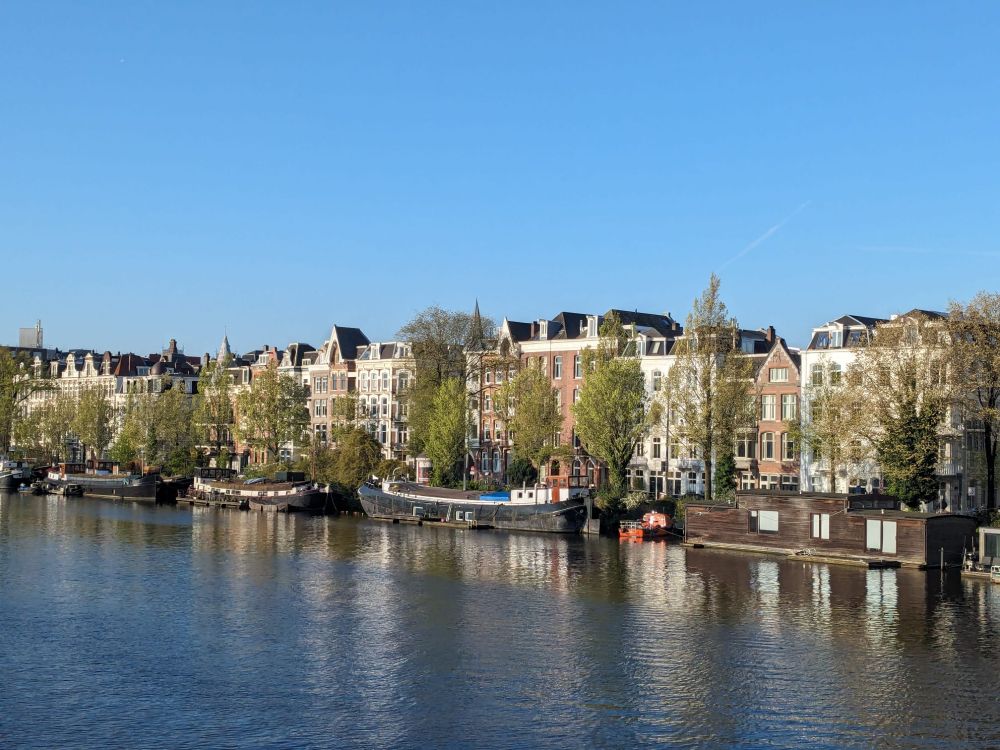 View of the Amstel rivel in Amsterdam on a sunny day.