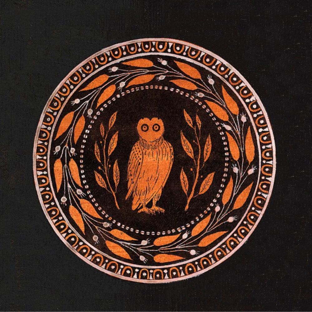 Image of Athena’s Owl, orange on black. 