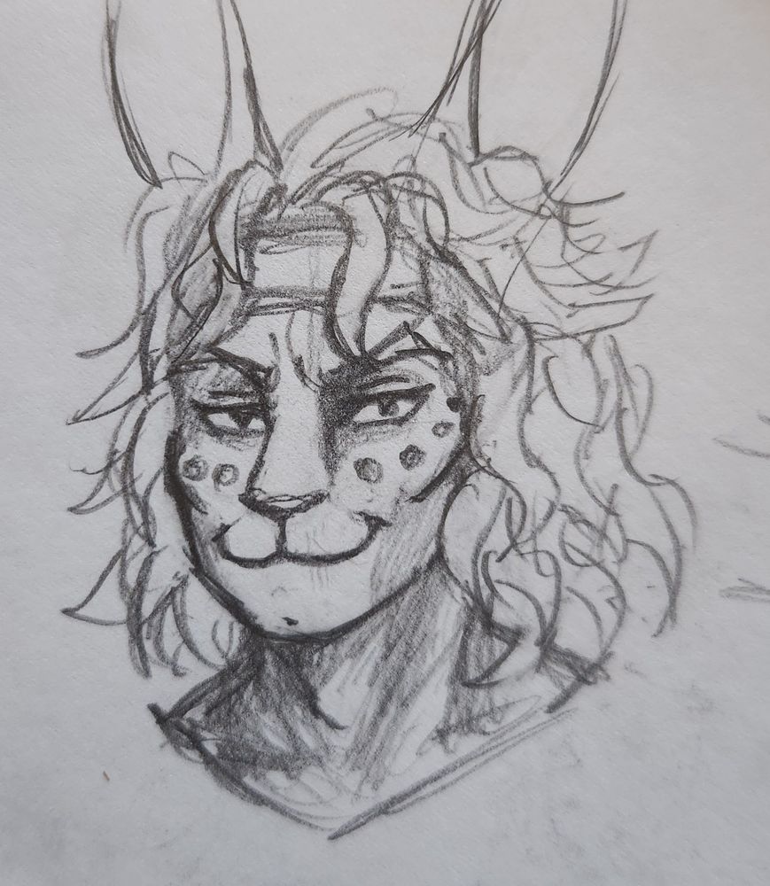 A rabbit man with long hair, a headband, and dots along his cheekbones looking confidently at the viewer