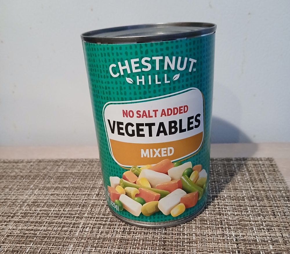 A green labeled can 