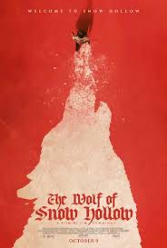 A poster for the movie Wolf Of Snow Hollow that shows a person walking from overhead in the snow making the shape of a wolf’s head. 