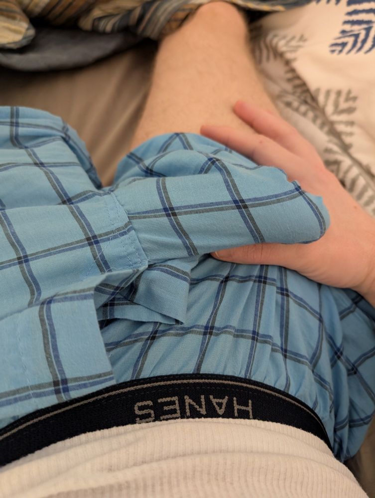 Me showing my bulge in some blue boxers