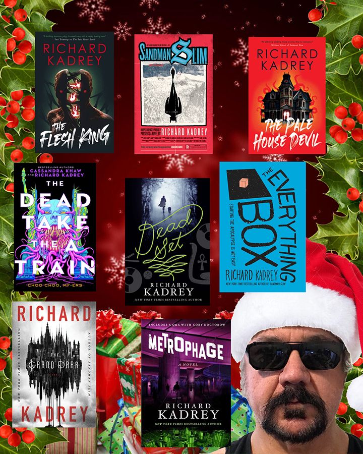A dumb Christmas ad with me in a Santa hat surrounded by The Flesh King, Sandman Slim, The Pale House Devil, The Dead Take the A Train, Dead Set, The Everything Box, The Grand Dark, and Metrophage.