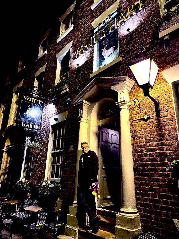 Chris Chibnall, author of the novel Death at the White Hart, stands in front of The White Hart pub on Hope Street in Liverpool, after Liverpool have beaten Everton 1-0, just saying. 