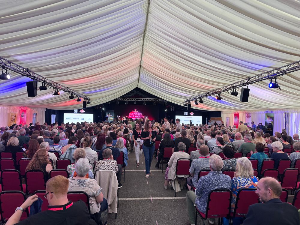 A packed tent awaits the start of the festival with the Thursday night awards 