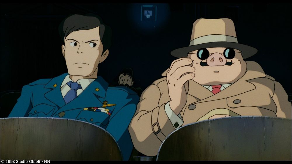 A screen capture of a scene in Porco Rosso when Porco Rosso said to Ferrari who is a major of the Regia Aeronautica "ファシストになるより、豚の方がマシさ" or in English dub: "I'd rather be a pig than a fascist"