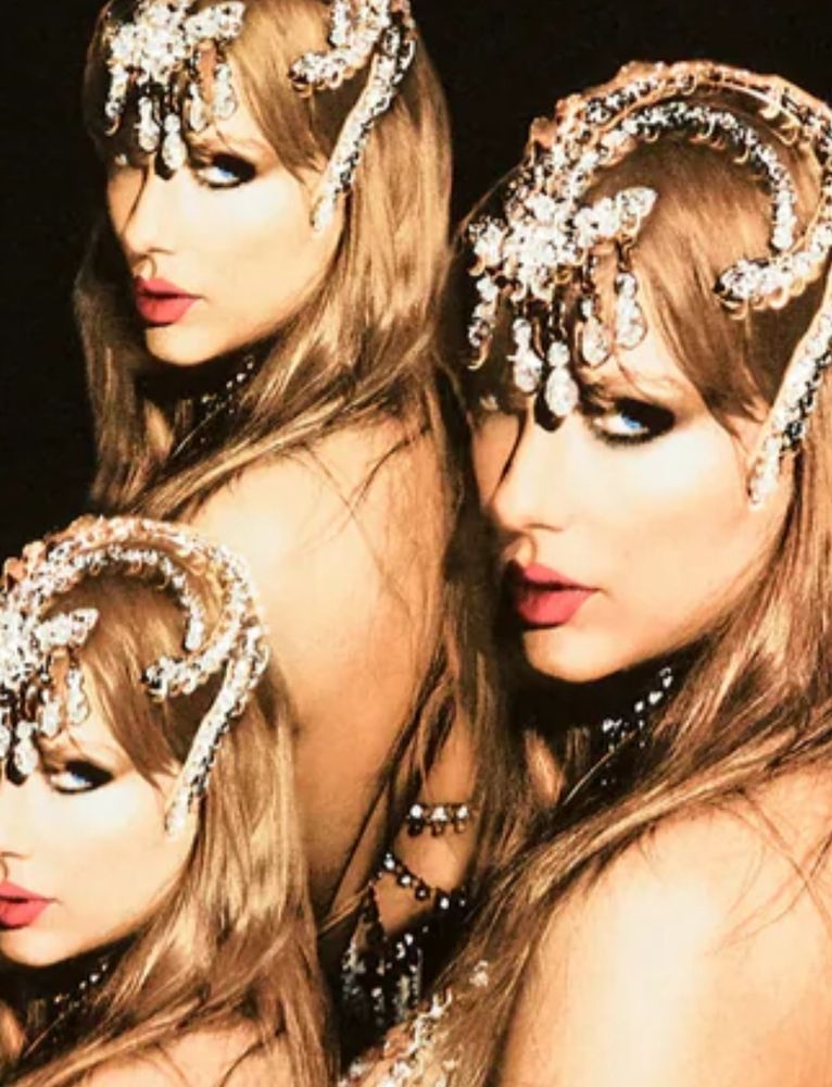 3 Taylor Swift? with a jewel headpiece on.