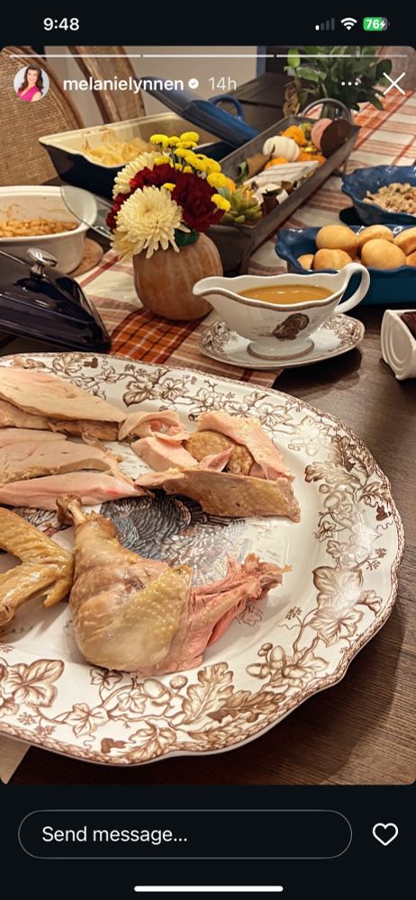 Melanie Newman Instagram story of her holiday table with some completely unseasoned turkey on a platter 