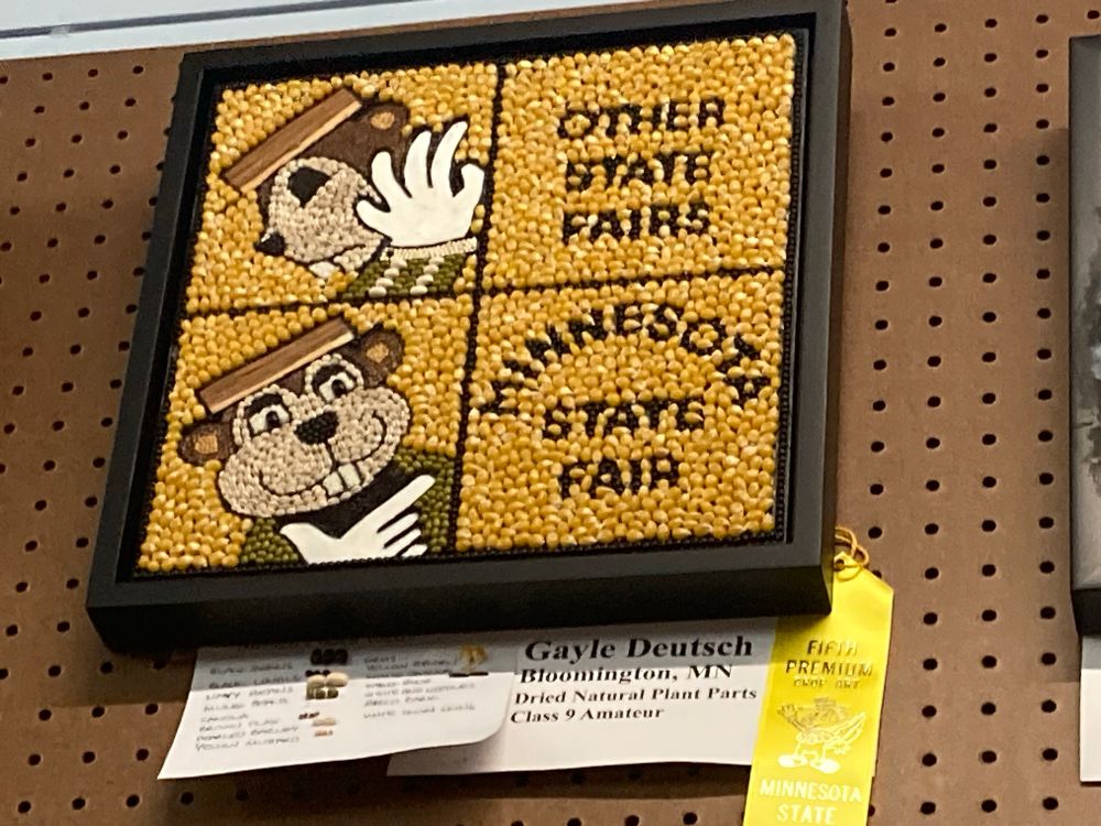 A crop art depiction of Minnesota State Fair mascots Fairchild and Fairborne doing the Drake Hotline Bling meme of "Other
State Fairs yuck, Minnesota State Fair yum" by Gayle Deutsch of Bloomington: it won a yellow ribbon