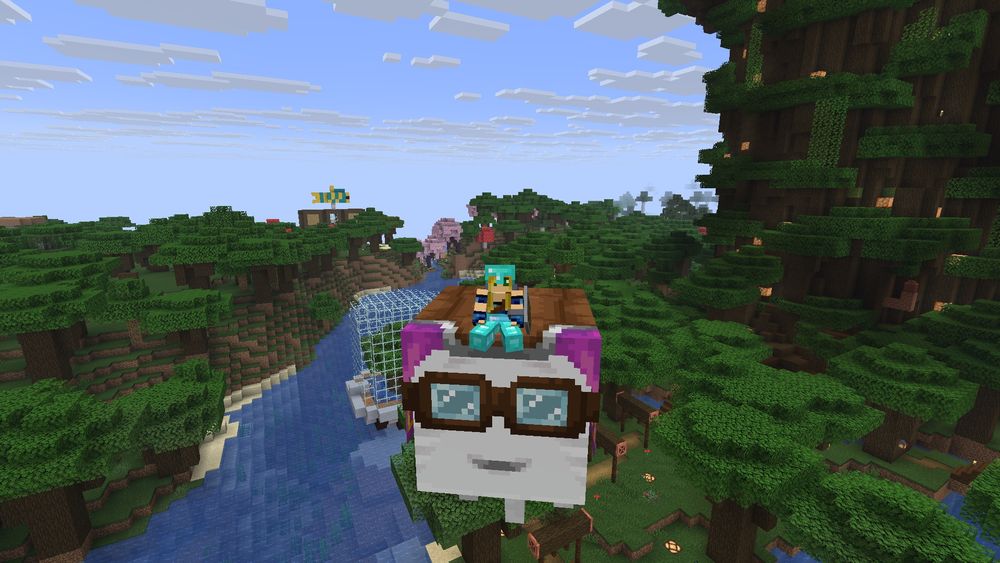 Screenshot aus Minecraft: Ankhees Spielfigur sitzt auf einem Happy Ghast mit magenta farbenem Geschirr über einem Schwarzeichenwald.