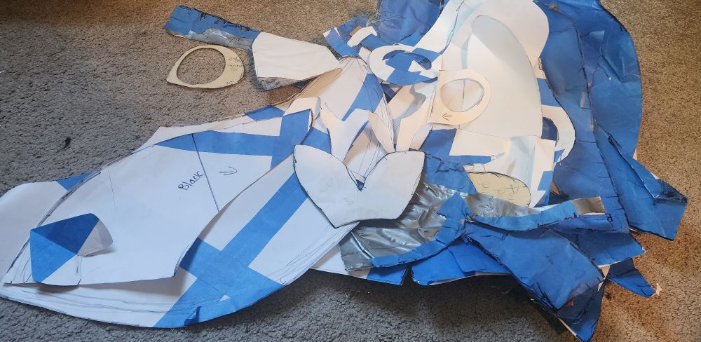 A mess of paper patterns used for sewing and drafting. 