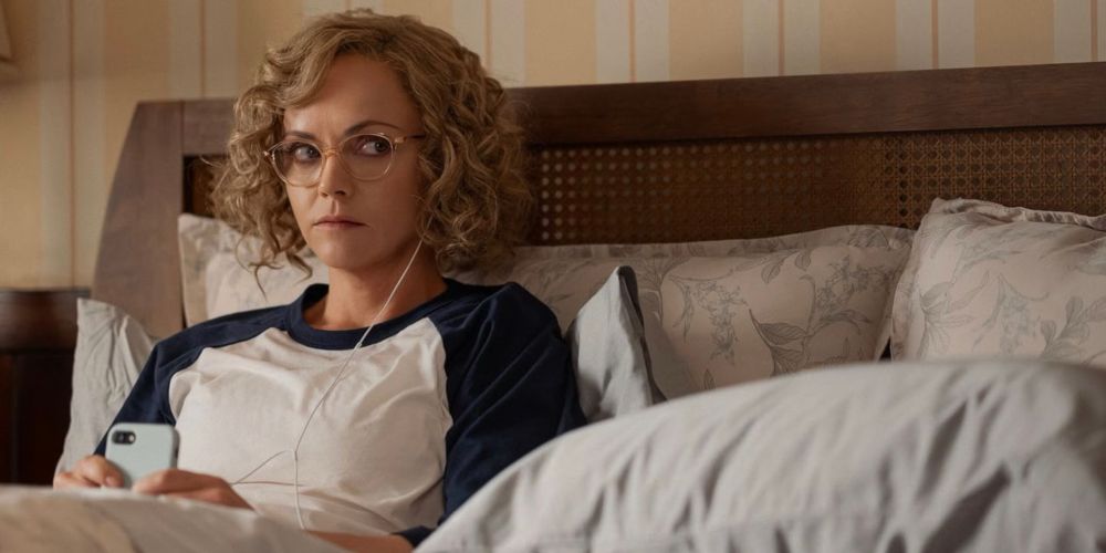 The character Misty Quigley from Yellowjackets giving side eye as her meditation is interrupted