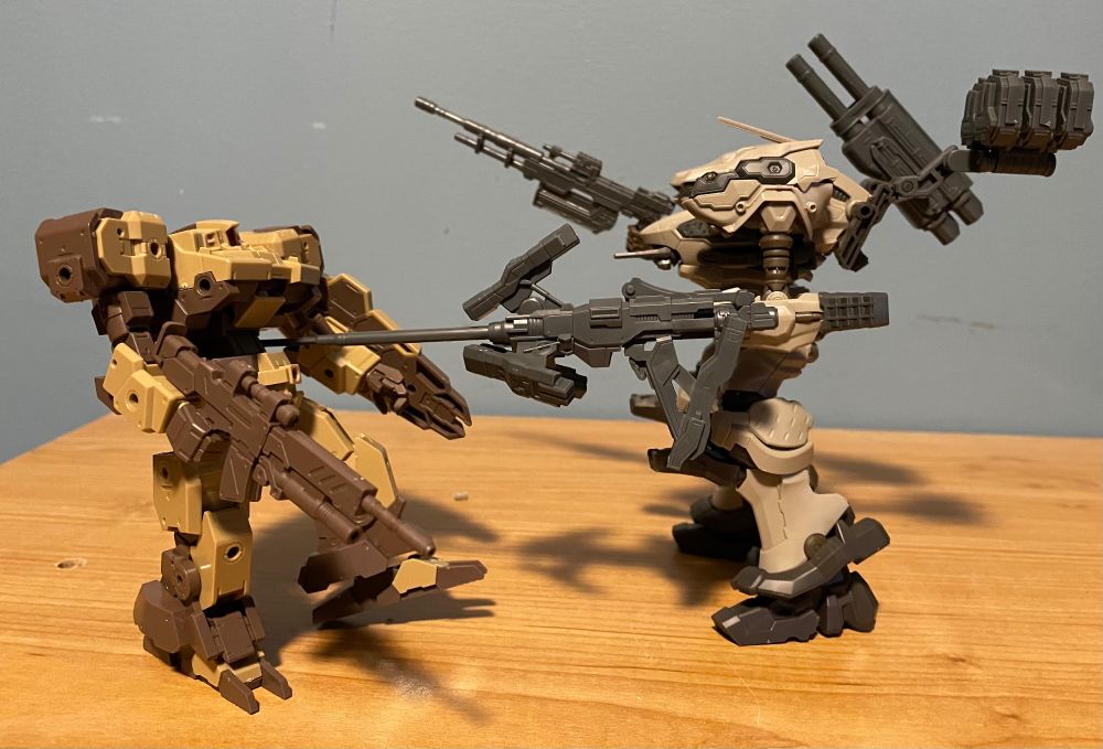 Bandai 30MM AC6 Nightfall model skewering another model on the extended pilebunker