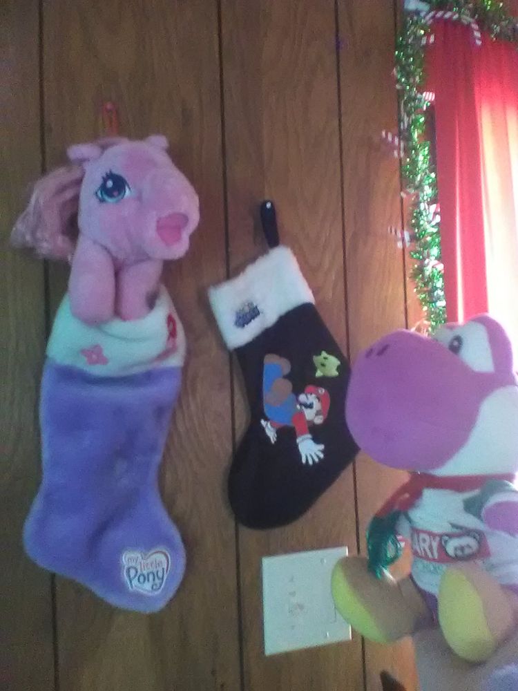 My Little Pony and Super Mario Galaxy stockings. Lilac Yoshi is also wearing a seasonal outfit.