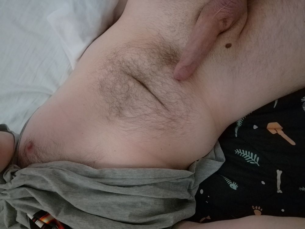 Top down view of my cock, shirt pulled up to show tummy and a nipple