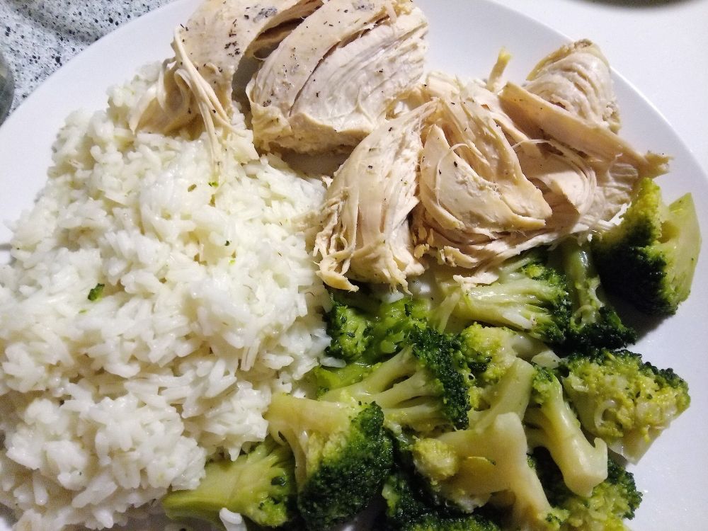 A handsome artist cooks for himself.