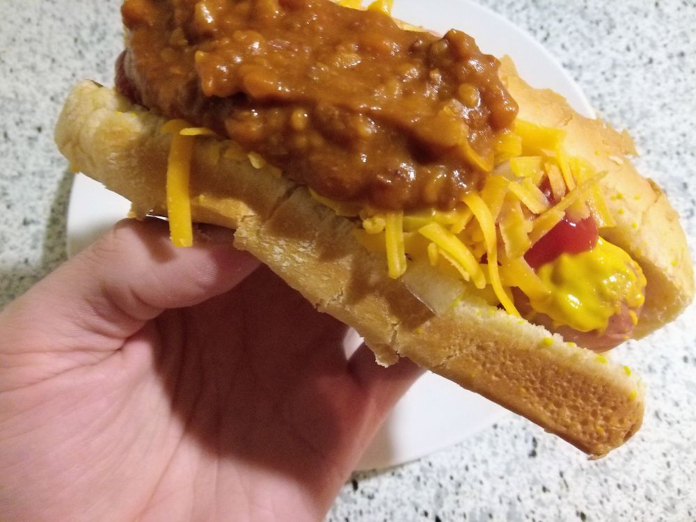 A handsome artist shoves another one down his throat.