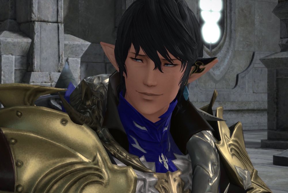 A picture of an Elezen man from Final Fantasy XIV, wearing blue and gold armour. He is giving a soft, almost wry smile to someone off-camera.
