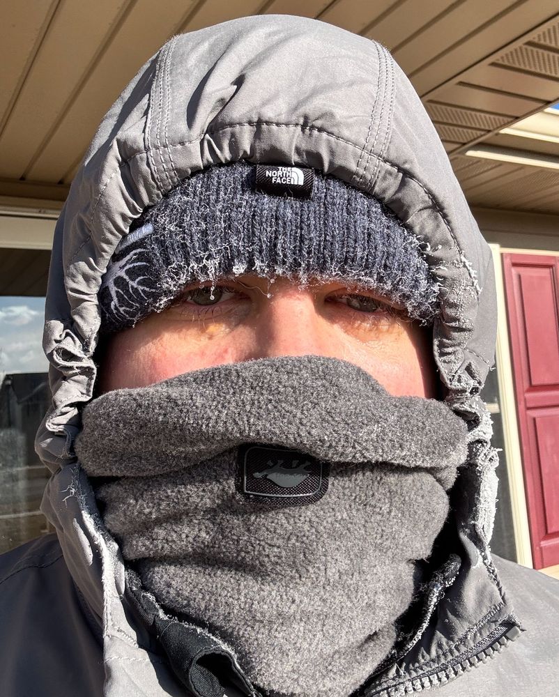me with cold weather gear on, ice forming on my hat and around my scarf and hood