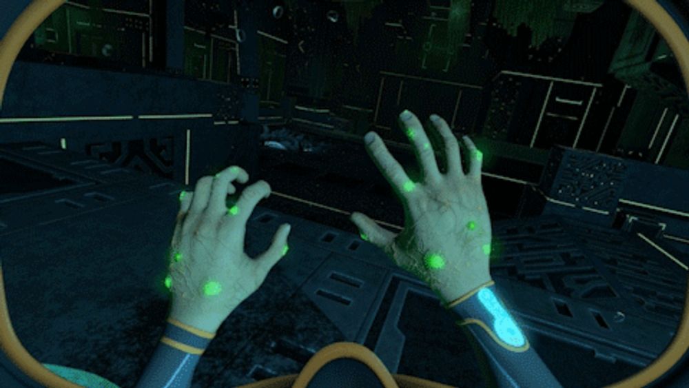 a person 's hands are glowing in the dark