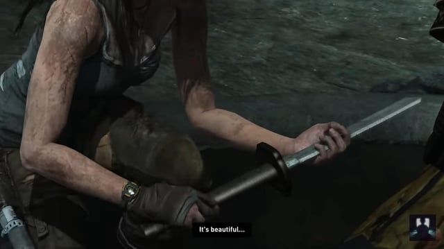 A prune of an archaeologist cutting her finder open on a broken sword in Tomb Raider. 