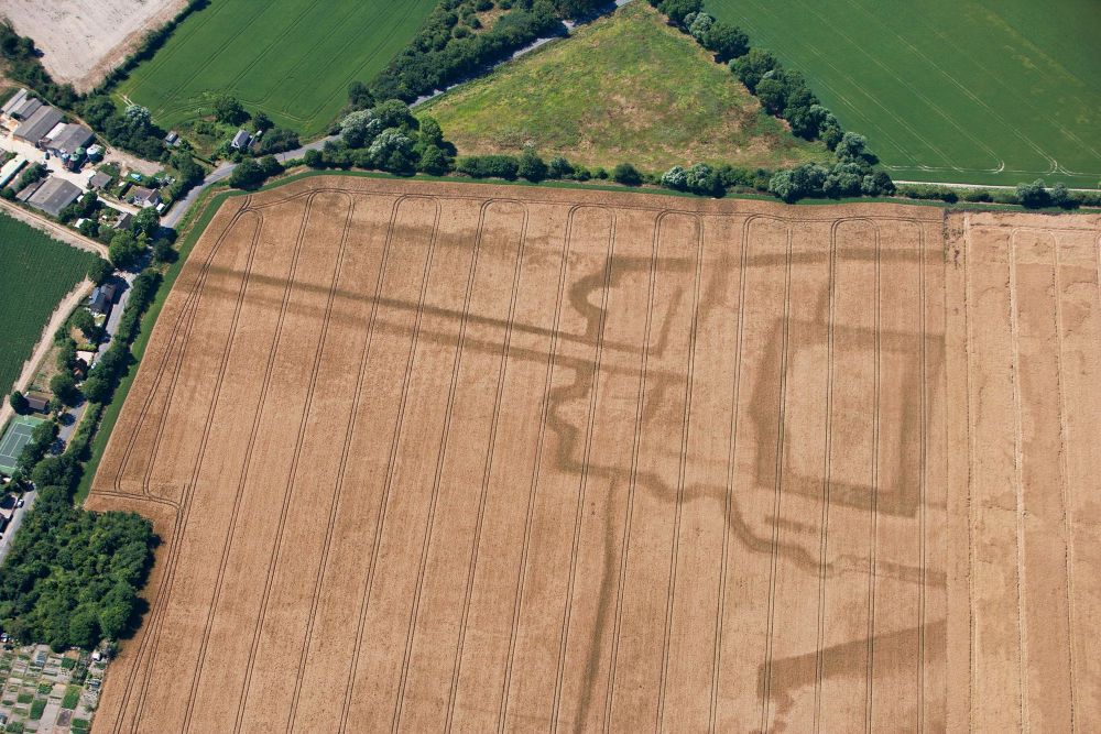 Aerial photo showing crop marks on a ploughed field.