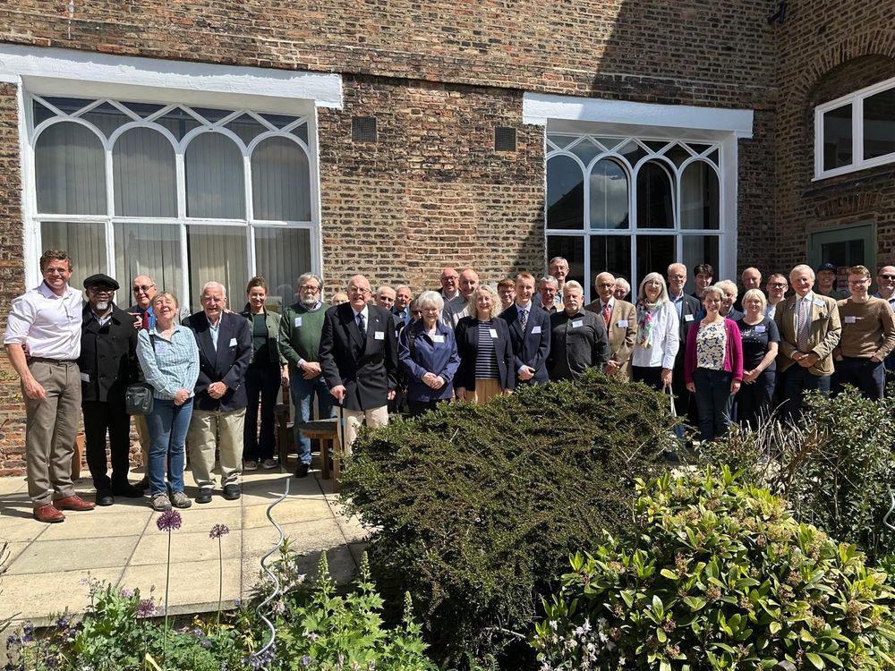 Attendees at the Flag Institute's spring conference, standing outside the conference venue.
