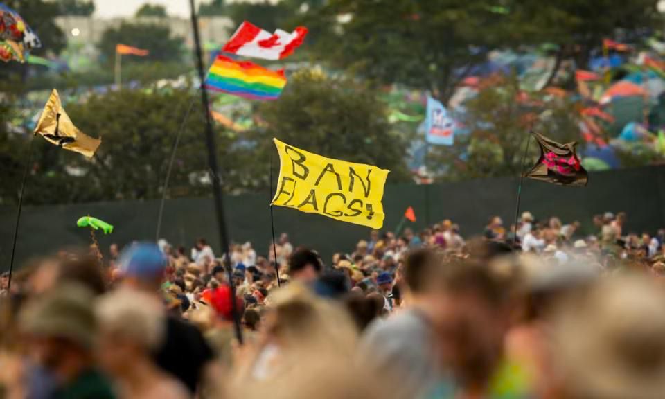 A flag seen at Glastonbury festival which reads ‘Ban flags’