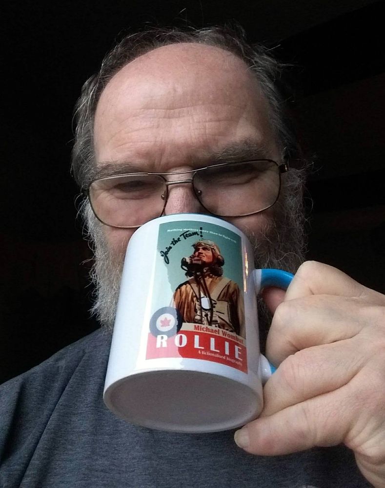 An old man now, drinking from my favourite 'Rollie' mug.