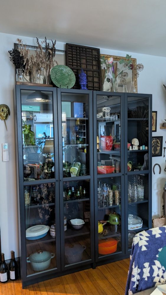 Two IKEA Billy bookcases with full length glass doors. #IKEA article number 192.177.21