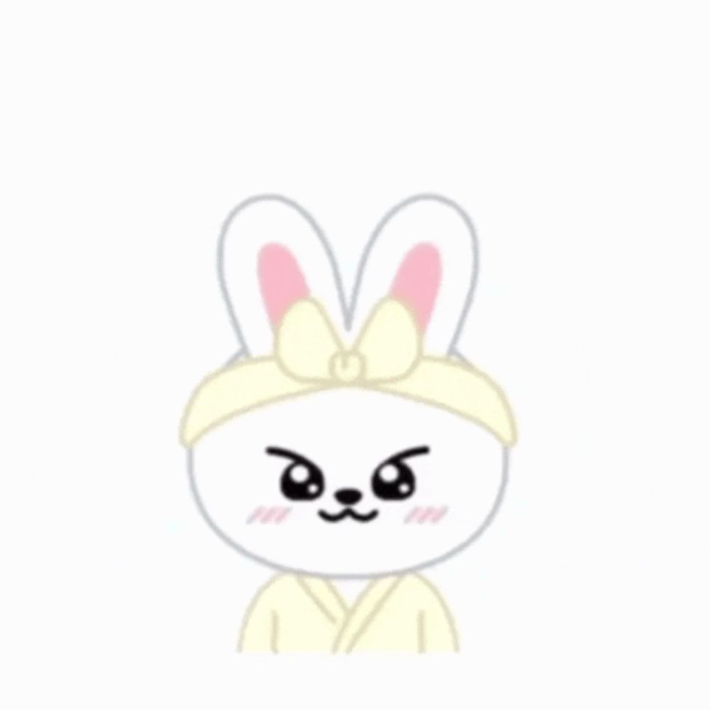 a cartoon rabbit wearing a yellow robe and a headband