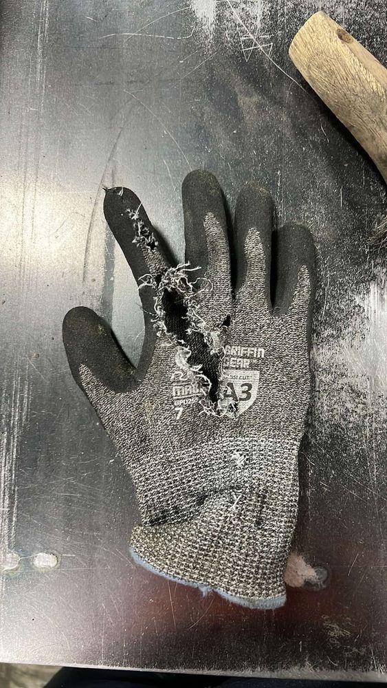 A Griffin Gear glove shredded from the index finger to the middle.