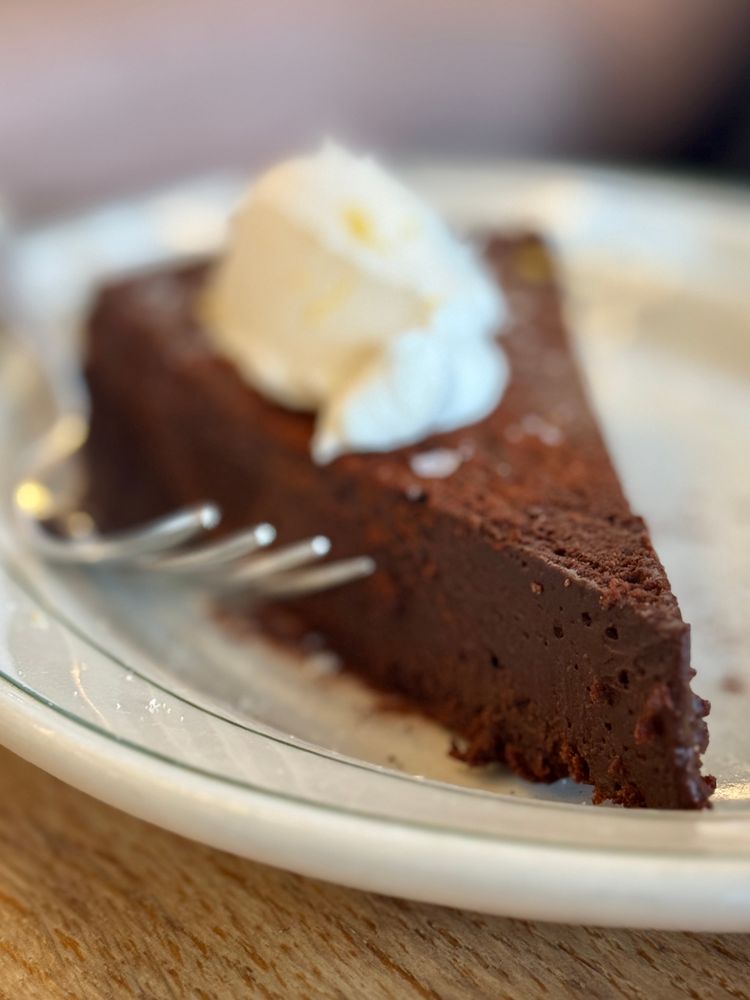 Chocolate torte with cream on top,’good but very rich. We couldn’t make it all the way through 