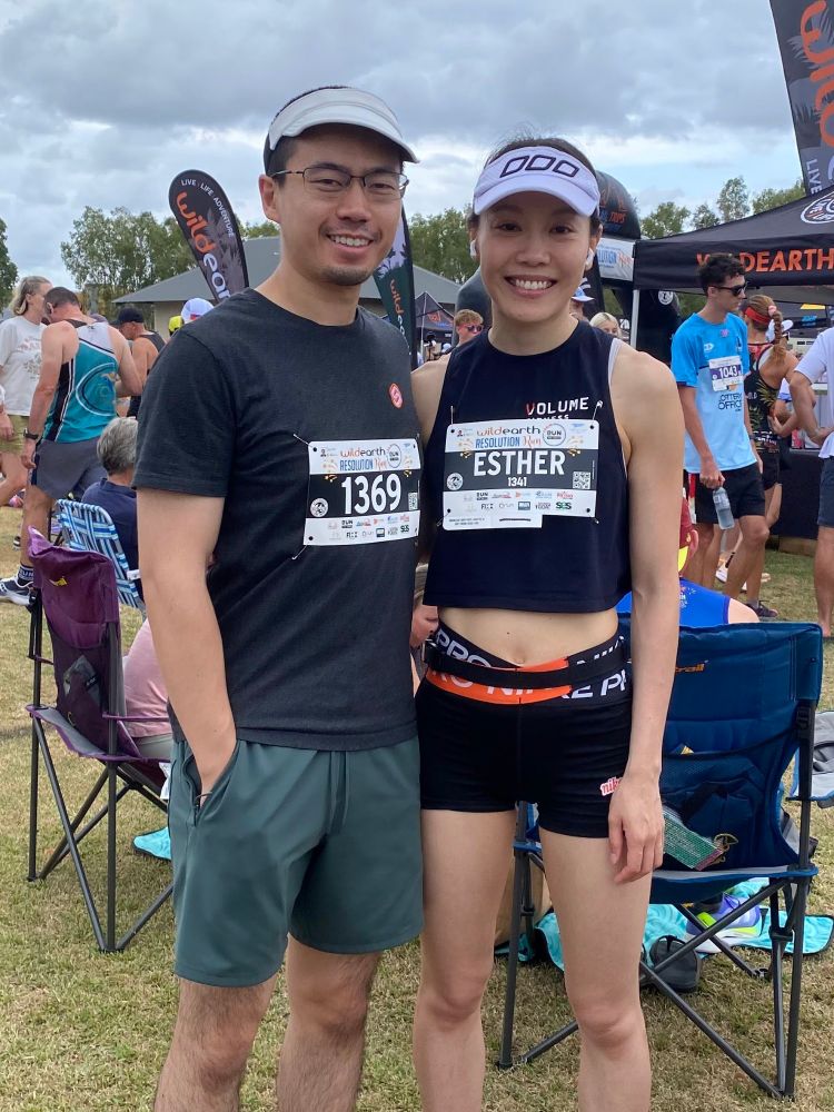 Ron Au at a running event wearing a SvelteJS shirt and bib number