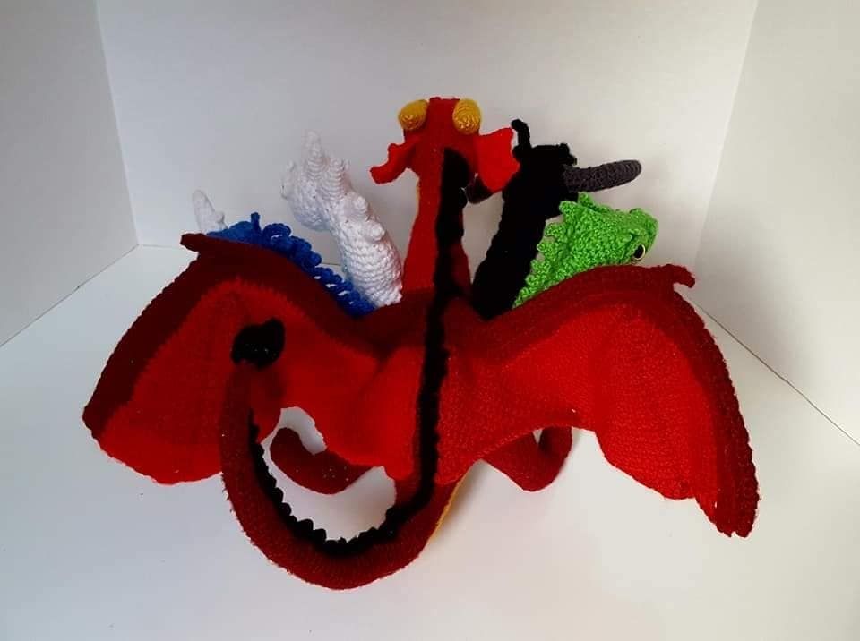 Crochet Tiamat (5-headed chromatic dragon) back displayed. 