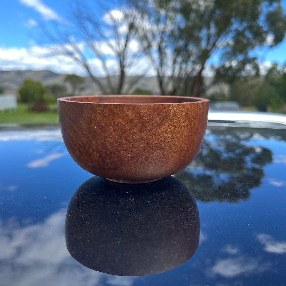 A small brown wooden bowl sits on the dusty roof of my black car. It’s a sunny day and the blue sky and soft white clouds and the gum tree in the middle distance are clearly reflected, as is the bowl itself. 

‘Art is never finished, only abandoned’ - Da Vinci (allegedly)